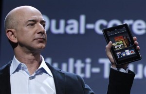 Amazon CEO Jeff Bezos holds up the new Kindle Fire. Photo by Shannon Stapleton, Reuters.